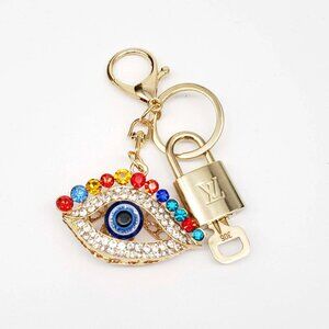 Authentic Louis Vuitton Lock & Key with unbranded Rhinestone Eye Bagcharm